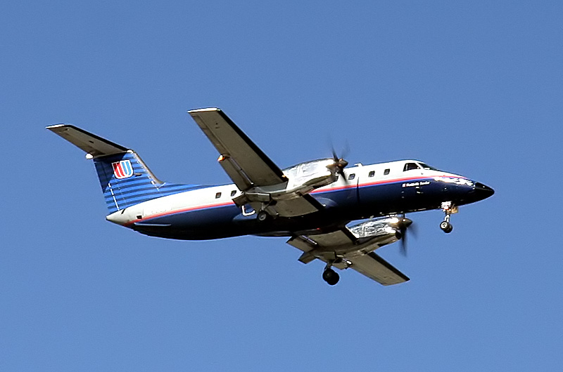 A small commuter plane about to land