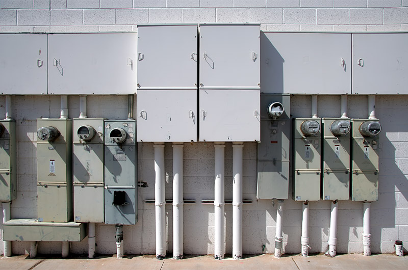 Electricity meters and lines entering a commercial building in Phoenix, Arizona