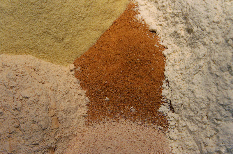 Getting ready to make homemade pasta with semolina flour, amaranth flour, mesquite flour, whole wheat and white flour