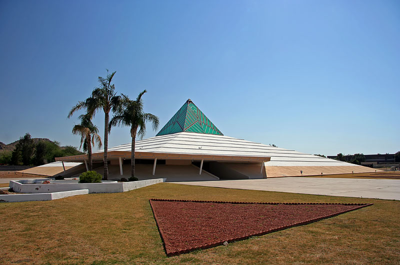 This pyramidal building was once a church, that sign is now gone and the grounds are falling to waste. Is it only a matter of time before this landmark is destroyed?