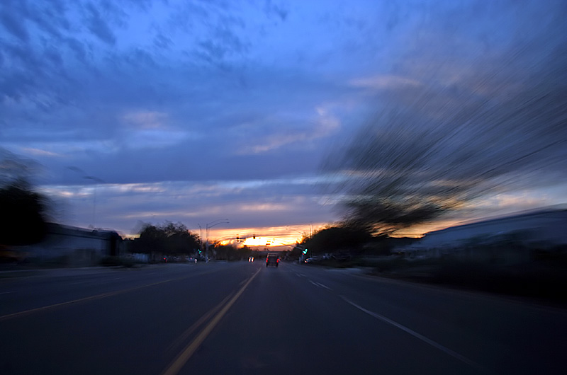 A long exposure taken at sunset driving west in Scottsdale, Arizona