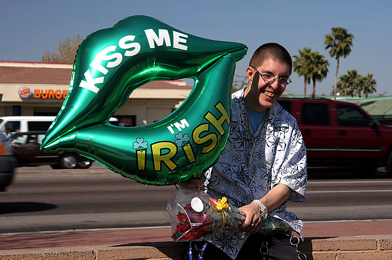 This guy was waiting at the bus stop for a girl he met on the bus so he could deliver a couple of gifts here in Phoenix, Arizona