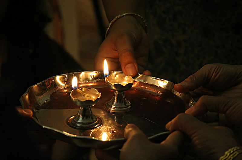 Offering a Hindu prayer