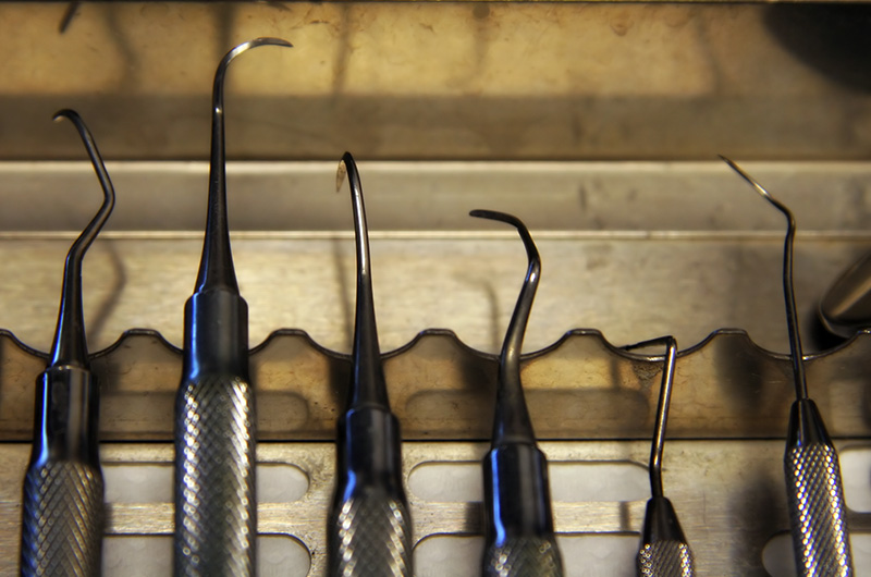 Sharp pointy tools for cleaning teeth at the dentist