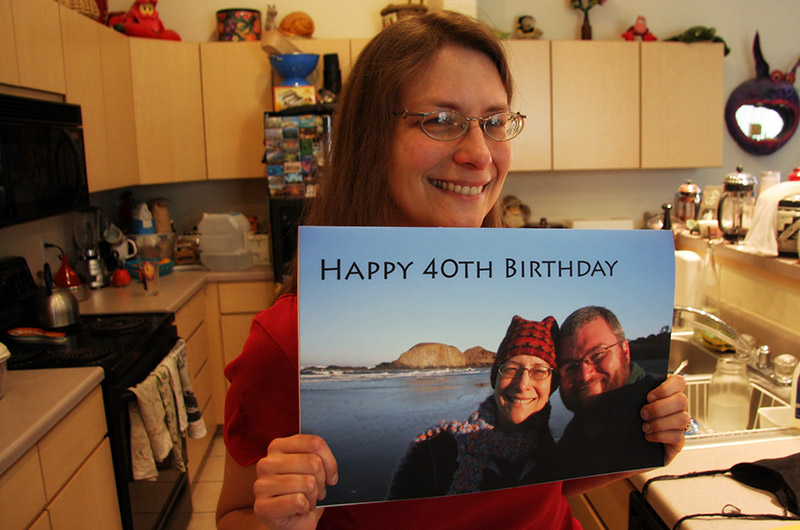 Caroline Wise holding her 40th birthday card in Phoenix, Arizona