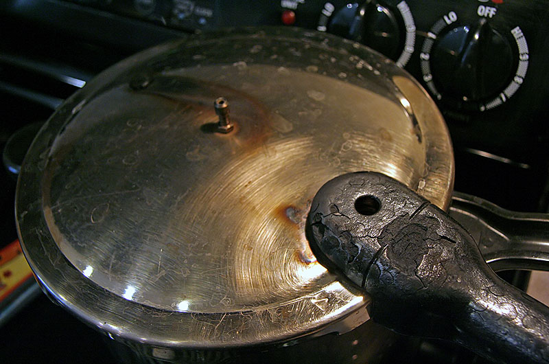 Destroyed pressure cooker from being left in oven during cleaning cycle