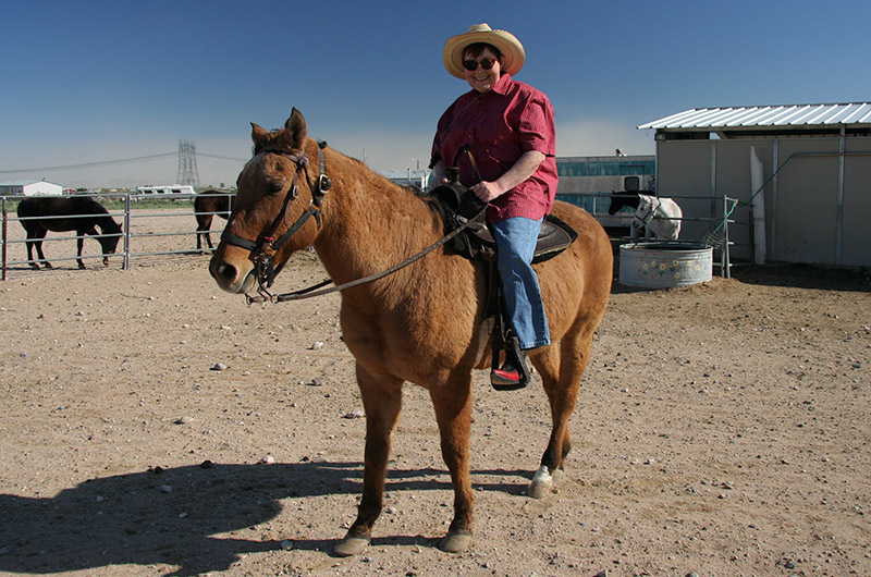 Jutta Engelhardt on her first horseback riding lesson with Celia at Chile Acres in Tonopah, Arizona