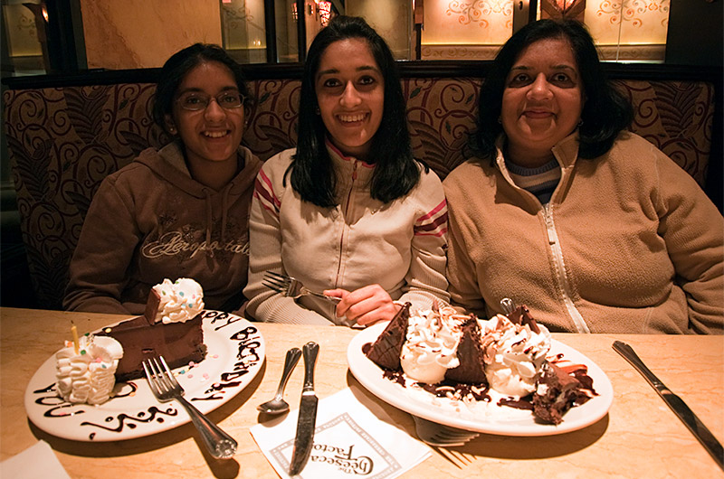 Kushbu, Hemu, and Sonal Patel having a sweet to celebrate Kushbu's birthday at Cheese Cake Factory in Phoenix, Arizona