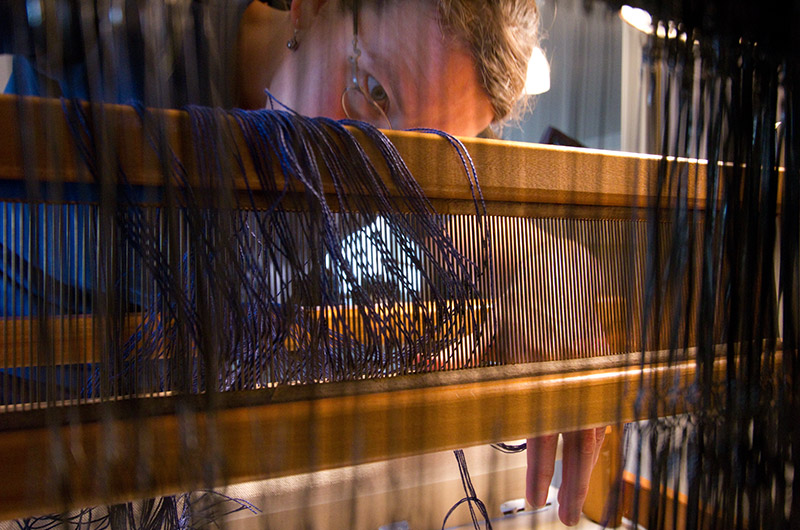 Caroline Wise learning to setup and weave on a Dorothy loom