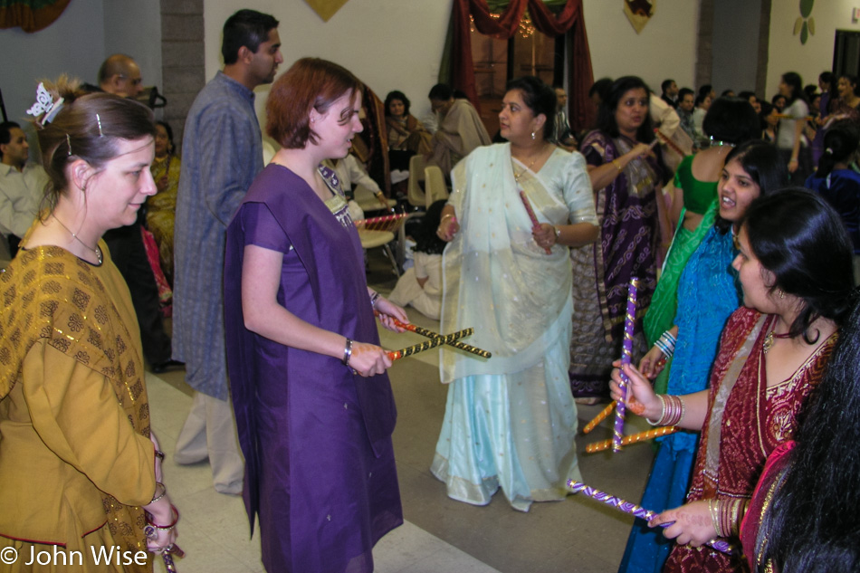 My daughter Jessica Wise dancing with Dandiya at a Garba held for a friend getting married here in Phoenix, Arizona