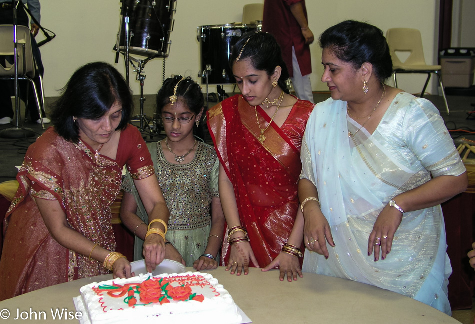 Anju Patel, Kushbu Patel, Hemu Patel, and Sonal Patel cutting a cake for Kushbu's Birthday in Phoenix, Arizona