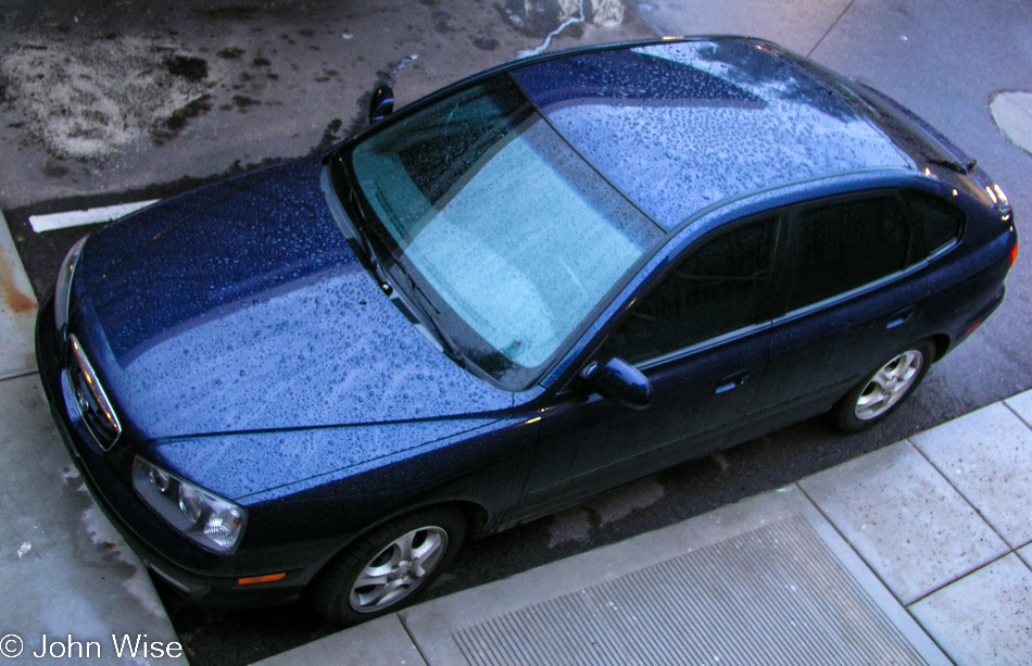 Our car on a gray rainy day