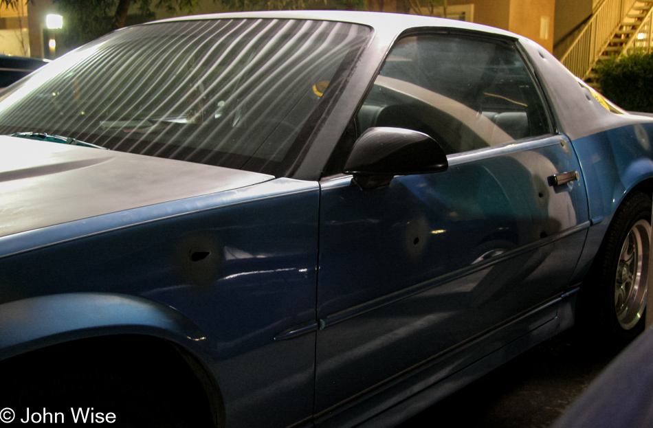 Bullet riddled car parked next to ours, are we in the wrong neighborhood?