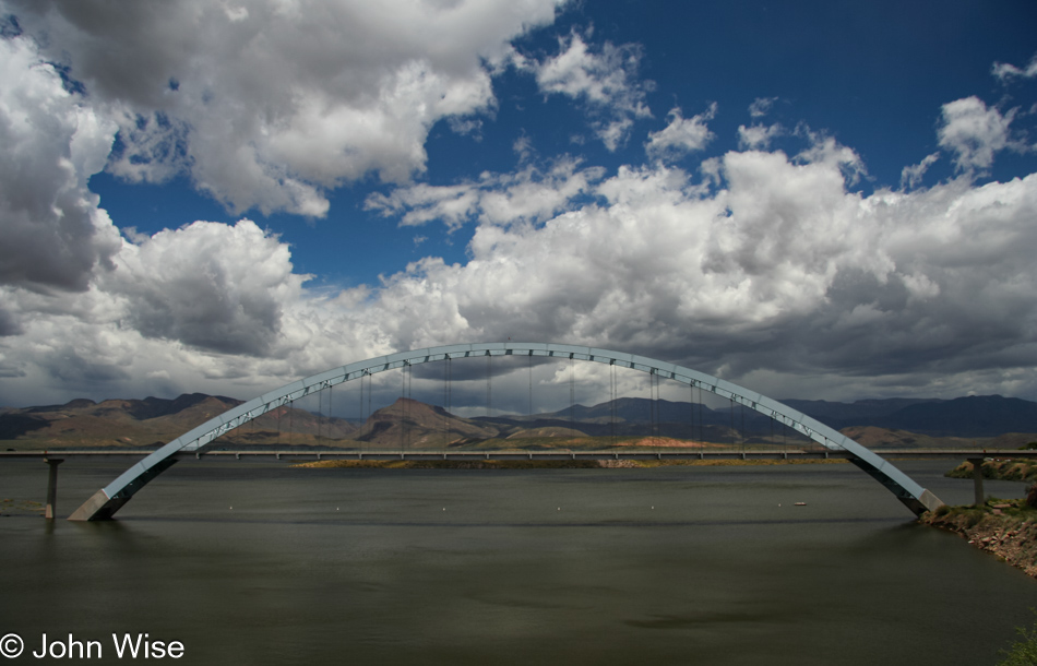 The bridge near Roosevelt Dam comes into view in Arizona on Lake Roosevelt