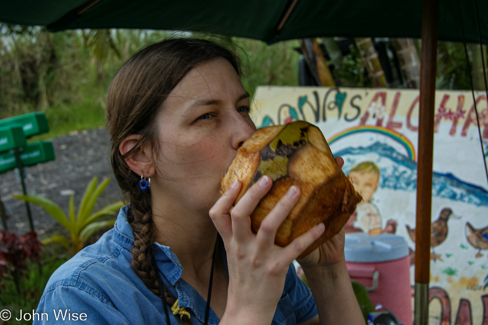 Caroline Wise with fresh coconut near Akaka Falls State Park in Honomu, Hawaii