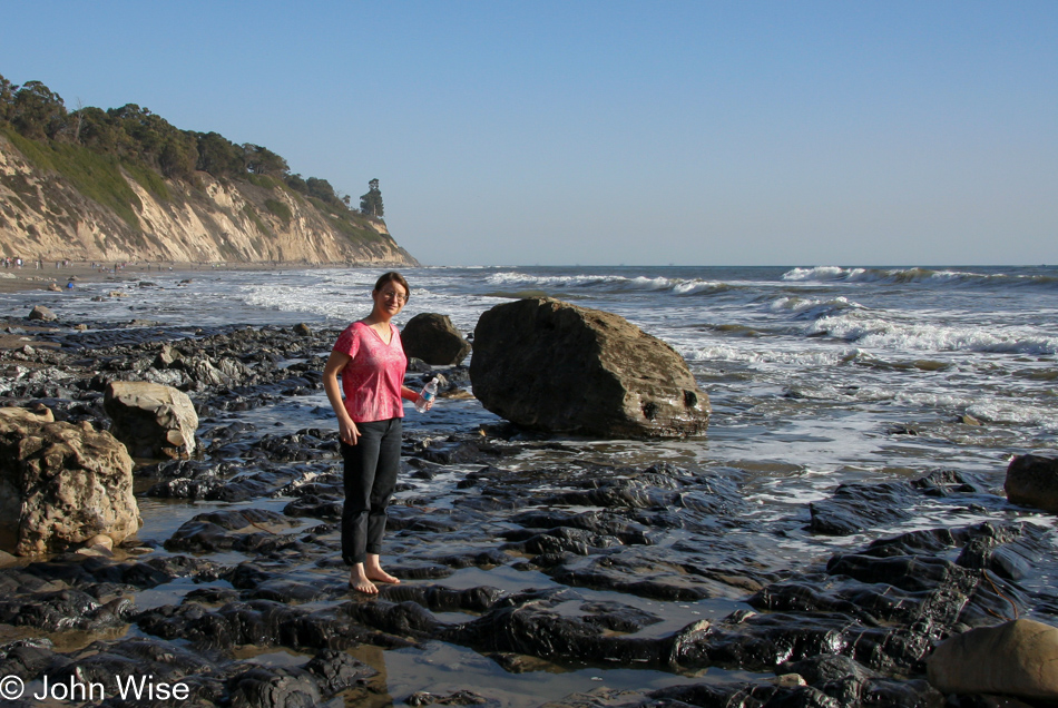 Caroline Wise on the shoreline of the Pacific ocean in Santa Barbara, California