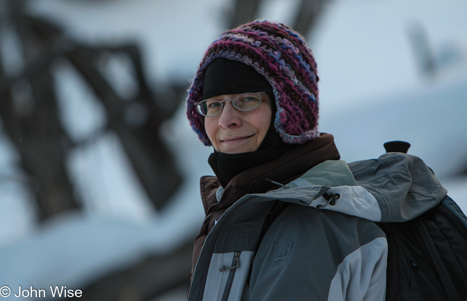 Caroline Wise on the Upper Terrace at Mammoth Hot Springs in Yellowstone National Park during a gray winter day