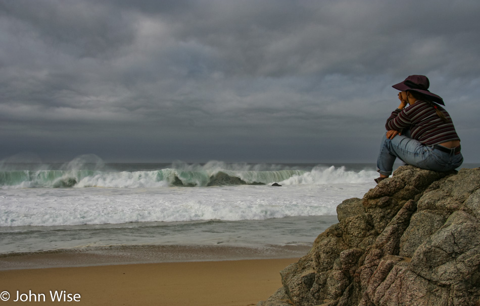 Caroline Wise contemplating the ocean in California