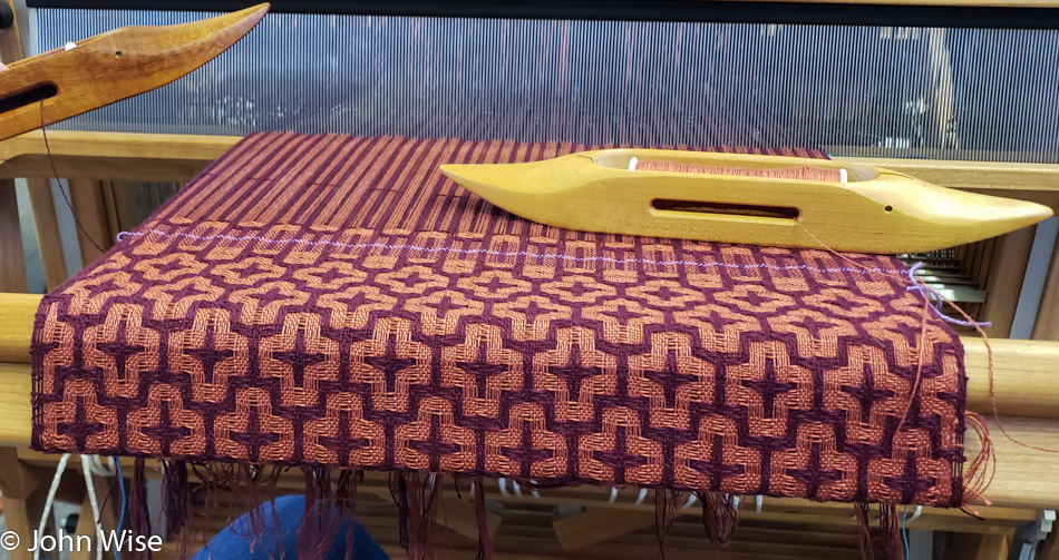 Caroline Fabric on her loom at a Weaving Workshop in Mesa, Arizona