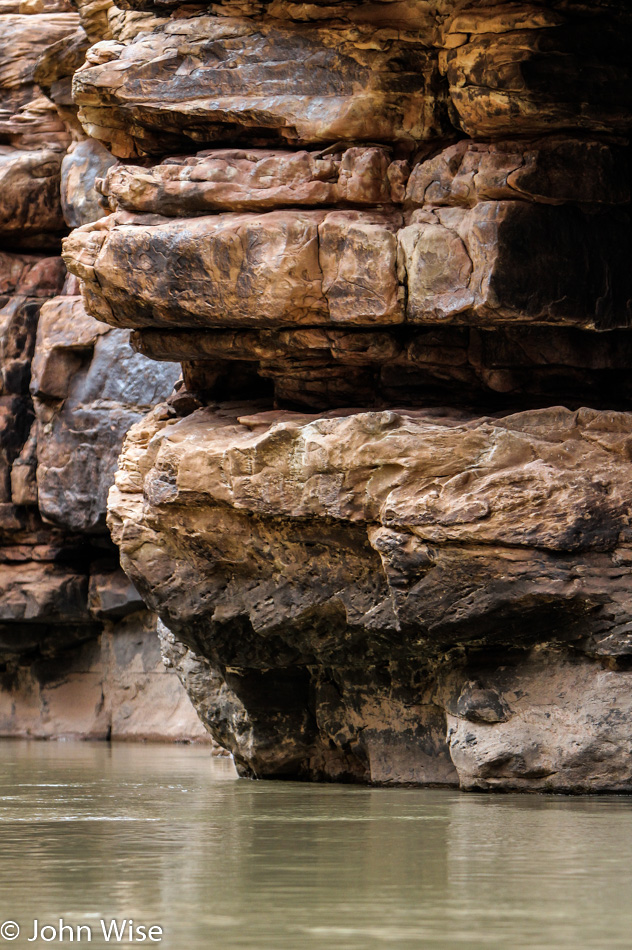 Ancient sandstone lining the Colorado River in the Grand Canyon