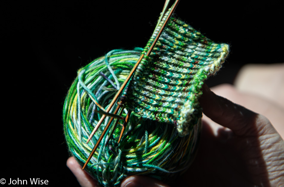 Caroline making handmade socks with yarn from Coos Bay, Oregon