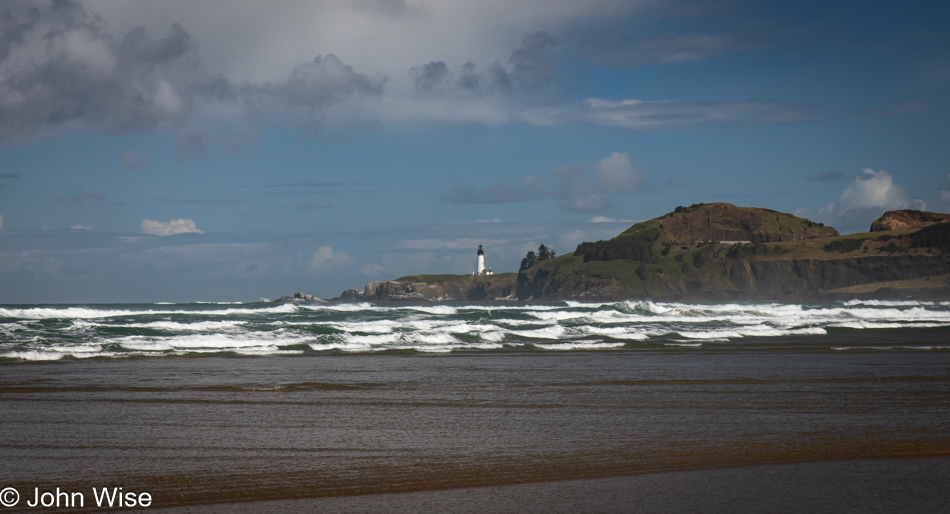 Yaquina Head Lighthouse seen from Nye Beach in Newport, Oregon