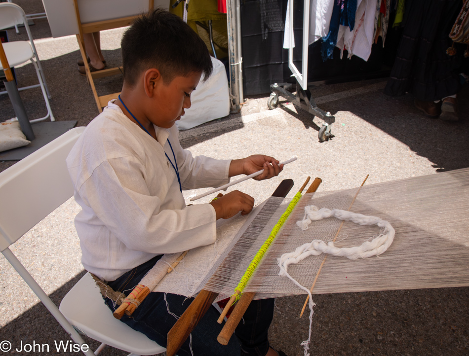 Backstrap weaver at the International Folk Art Market in Santa Fe, New Mexico