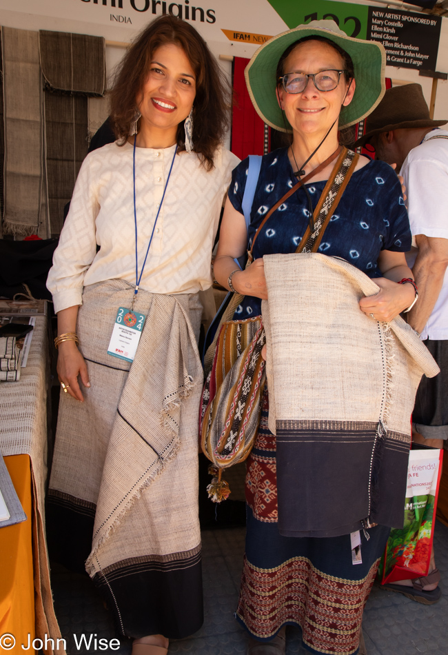 Caroline Wise with skirt from Nagaland, India at the International Folk Art Market in Santa Fe, New Mexico